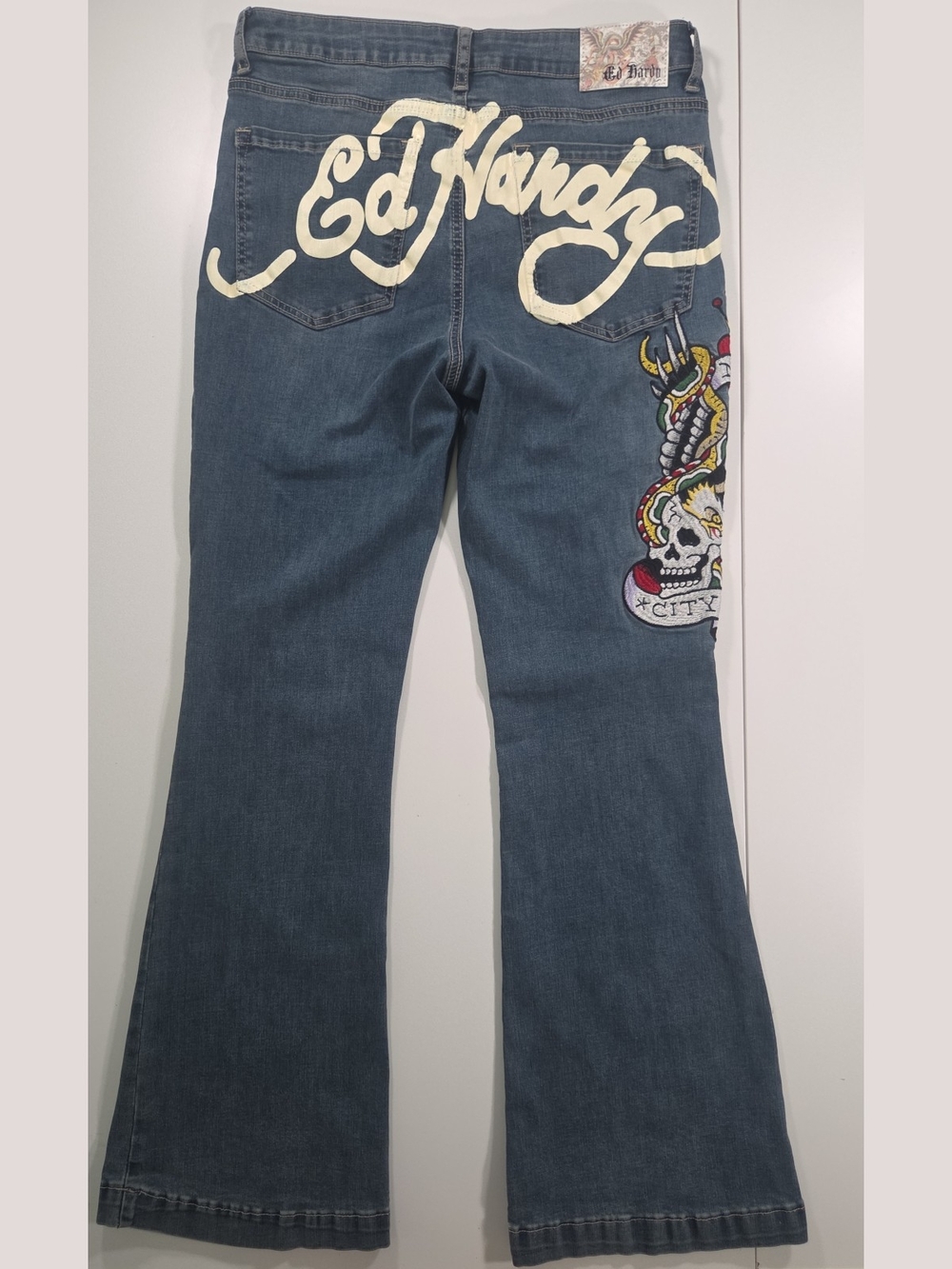 Ed Hardy Blue Bootcut Jeans with Bold Back Script and Skull Patch
